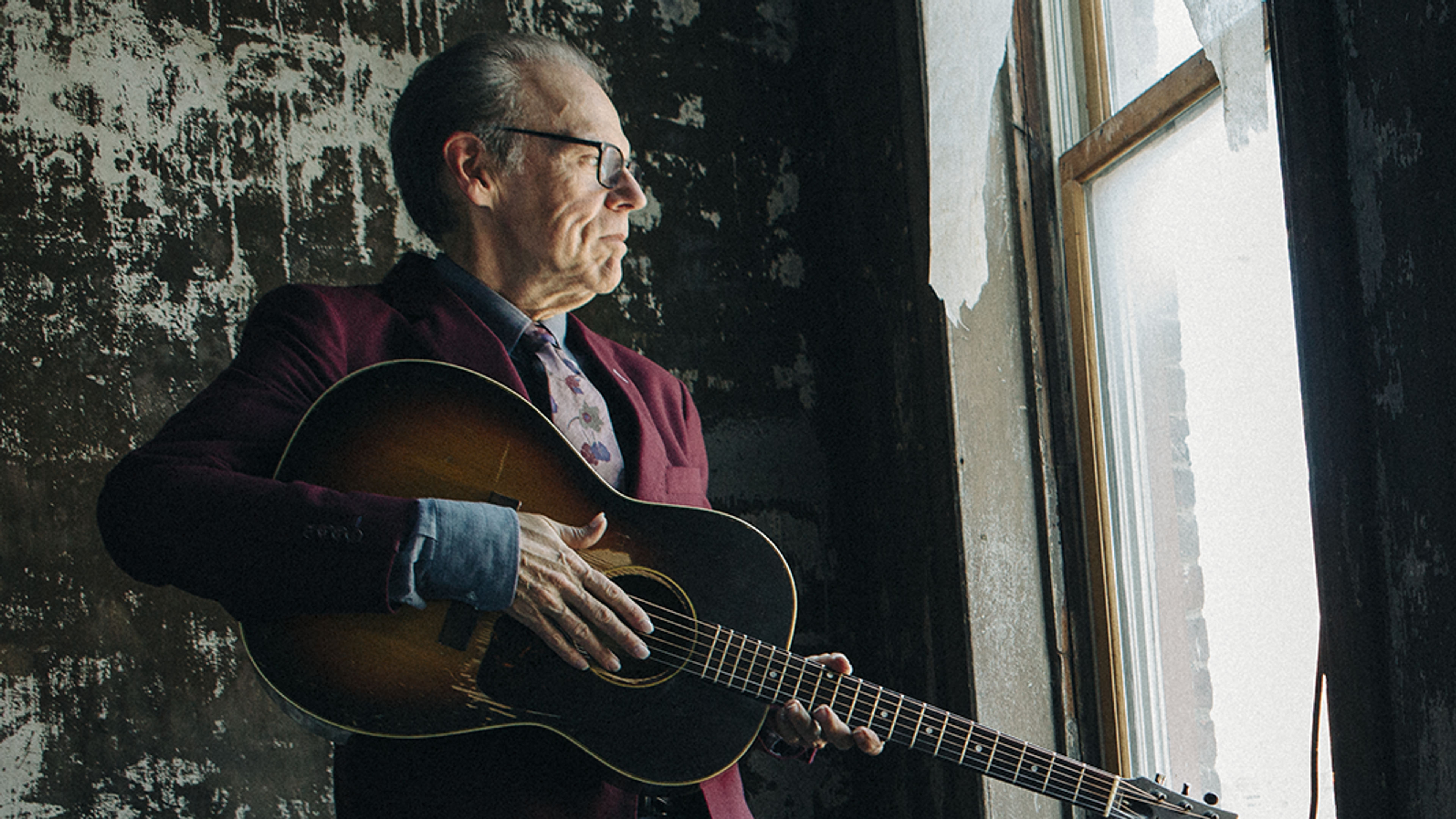 Promotional graphic for John Hiatt