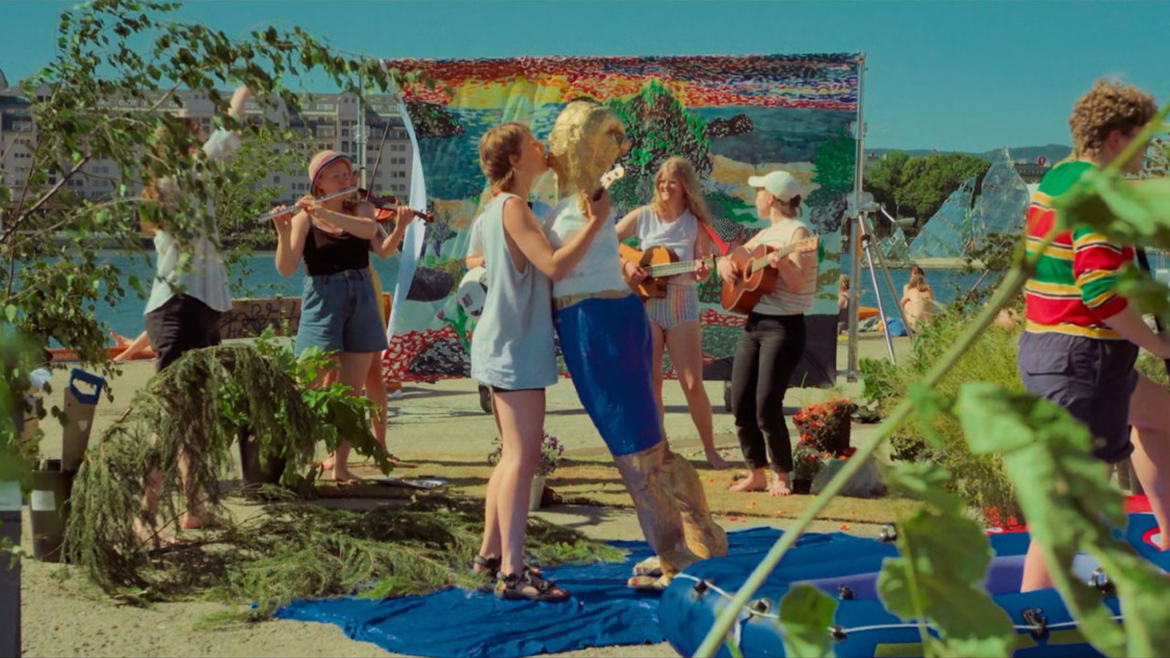 Promotional graphic for Musikkvideoslepp av Sliteneliten med åpen Mic og DJs og dans hele kvelden.