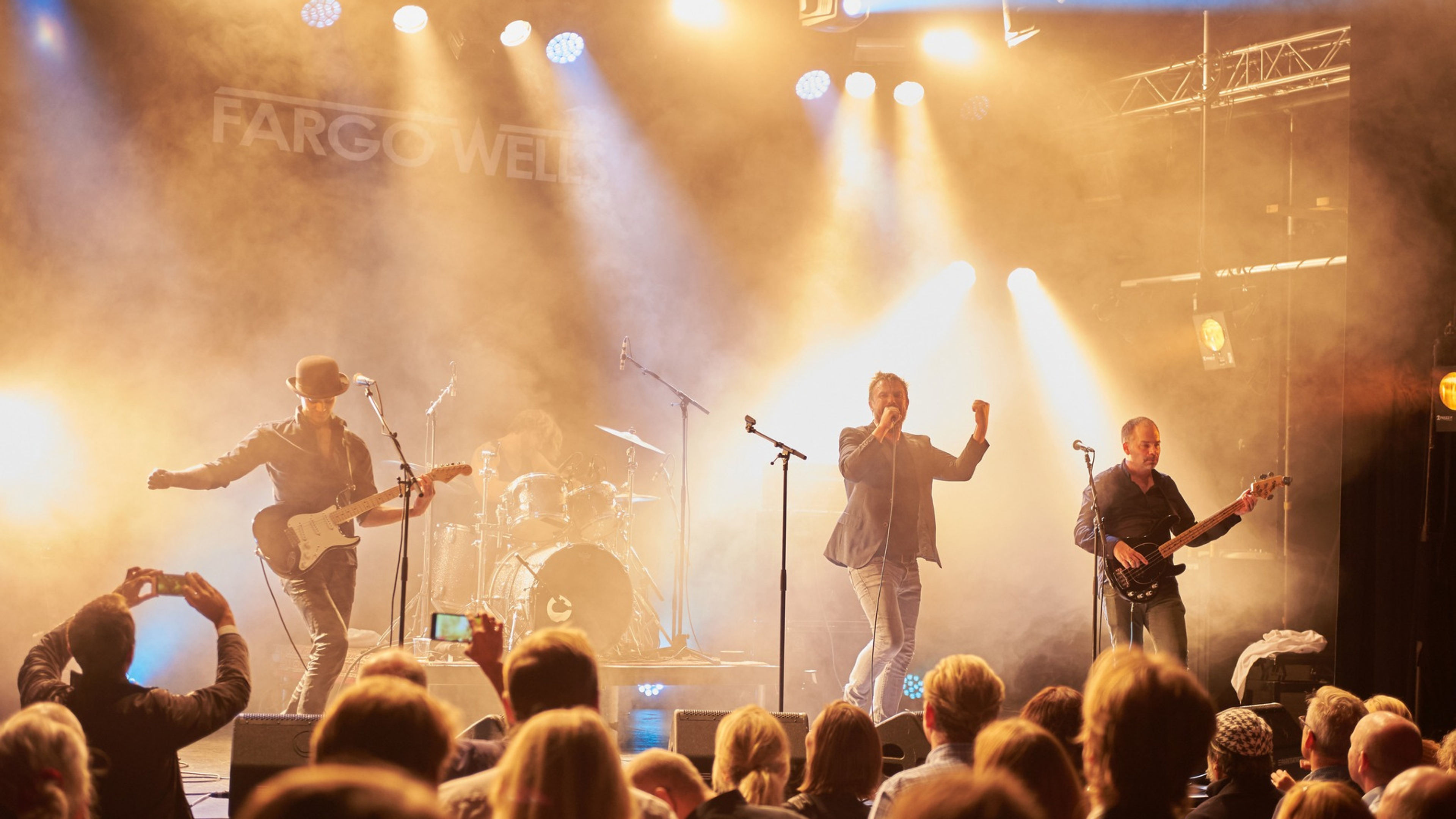 Promotional graphic for Fargo Wells på MIR