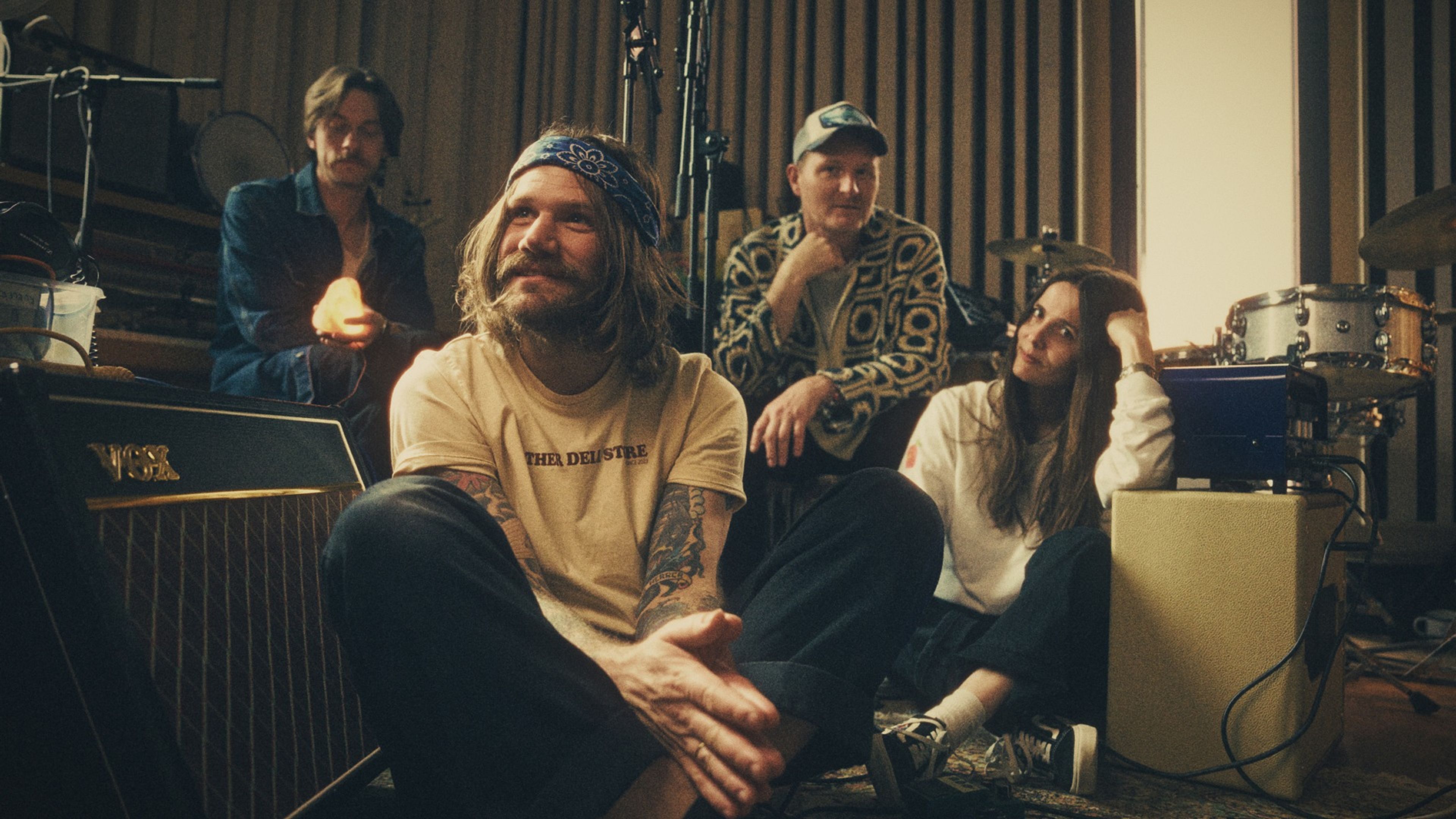 Promotional graphic for King Hüsky // Natt til første mai-konsert på Kampen Bistro!